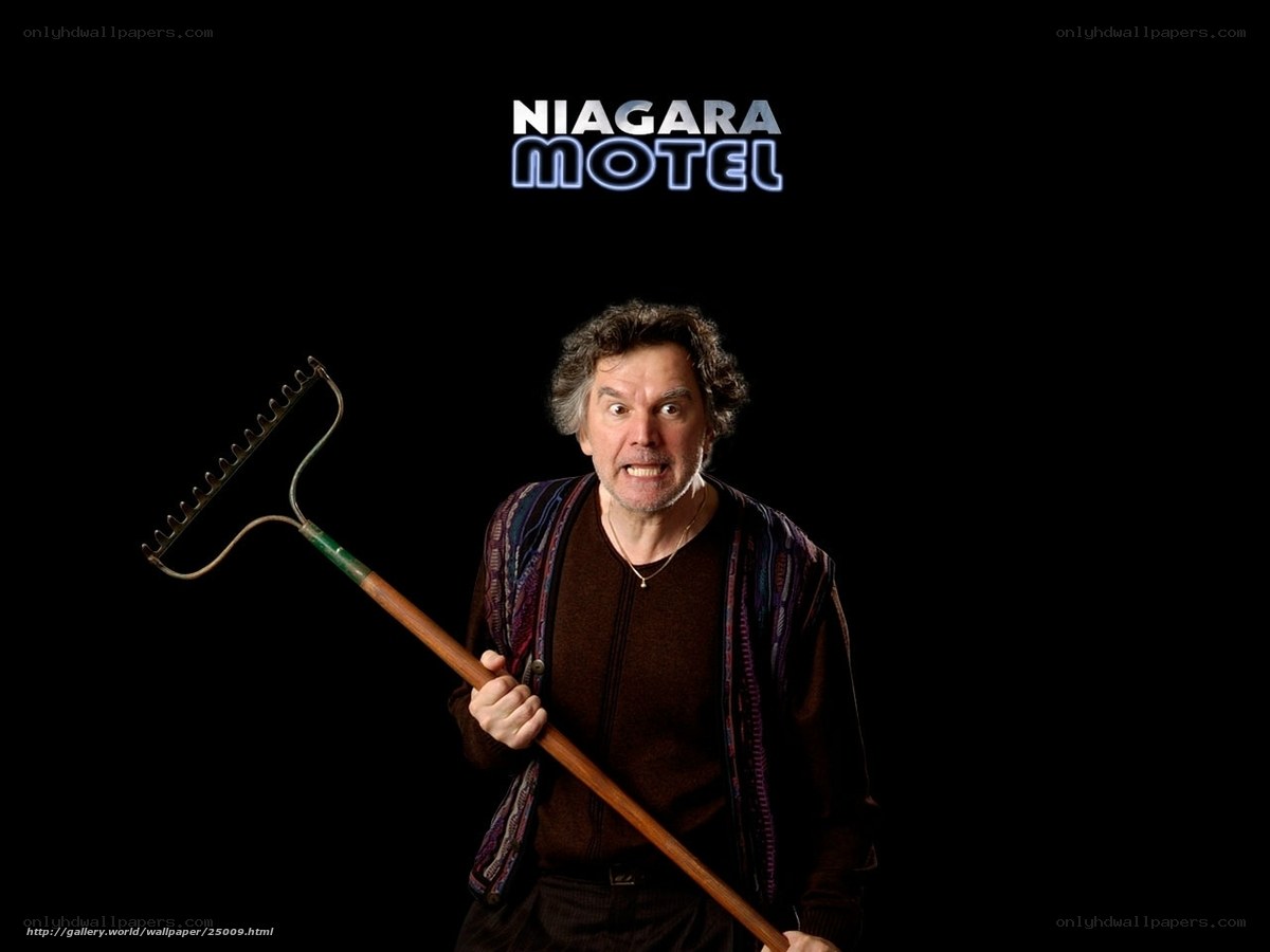 Man holding a rake