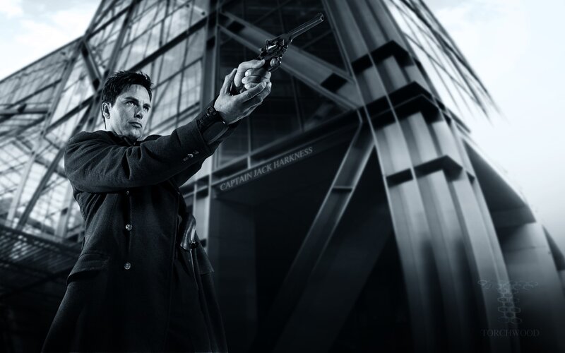 Man Holding a Revolver — Black