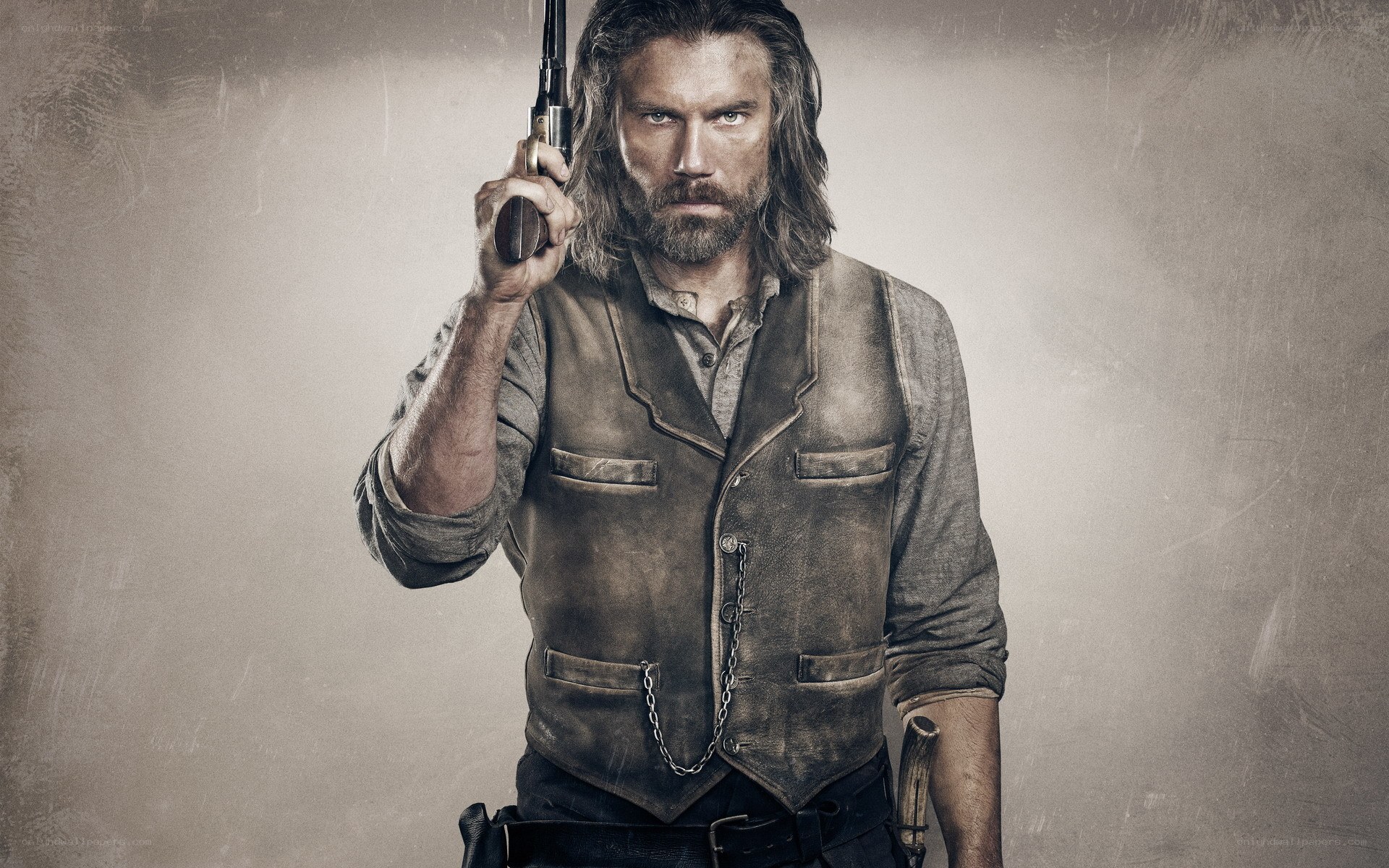 man holding a revolver