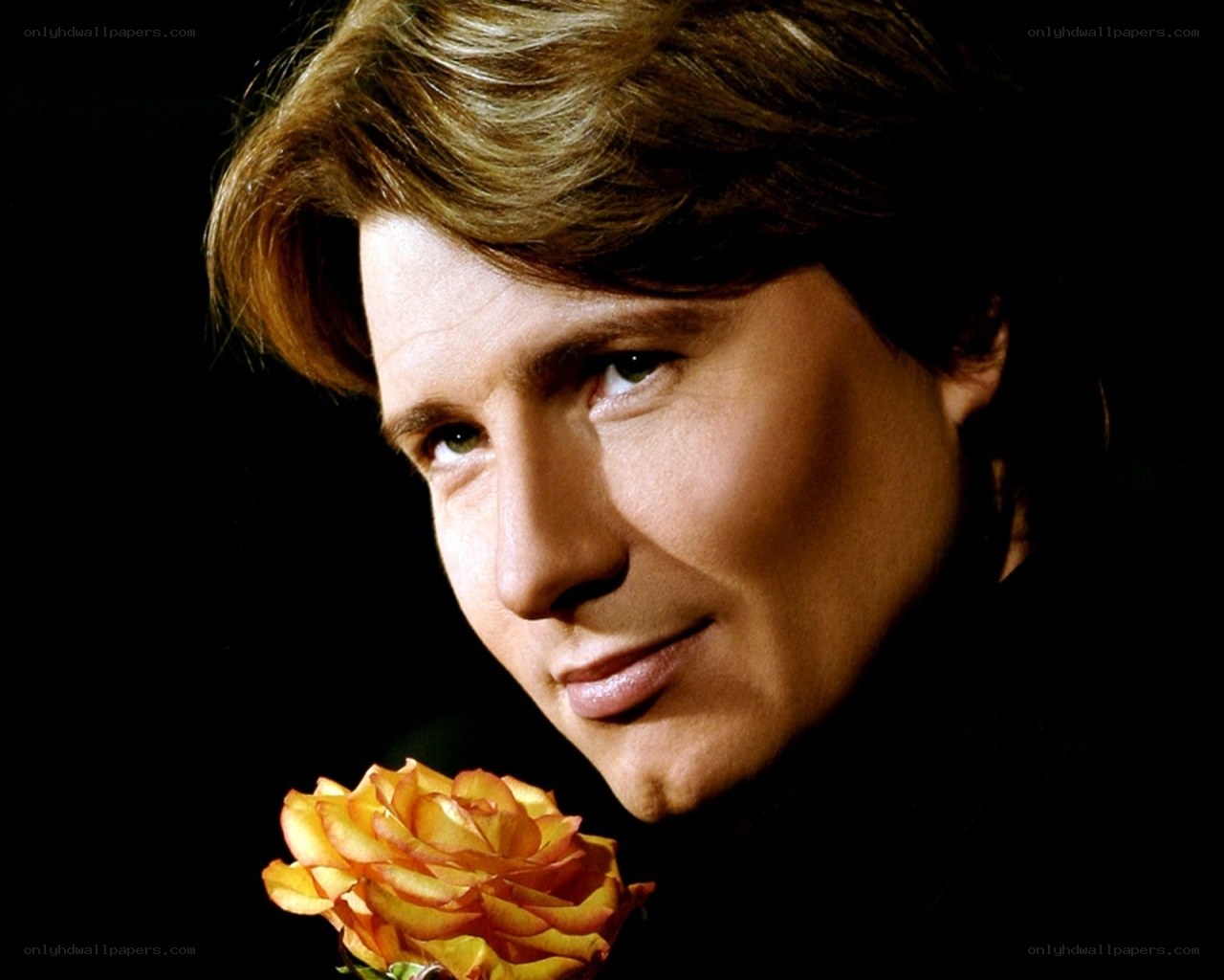 man holding a rose