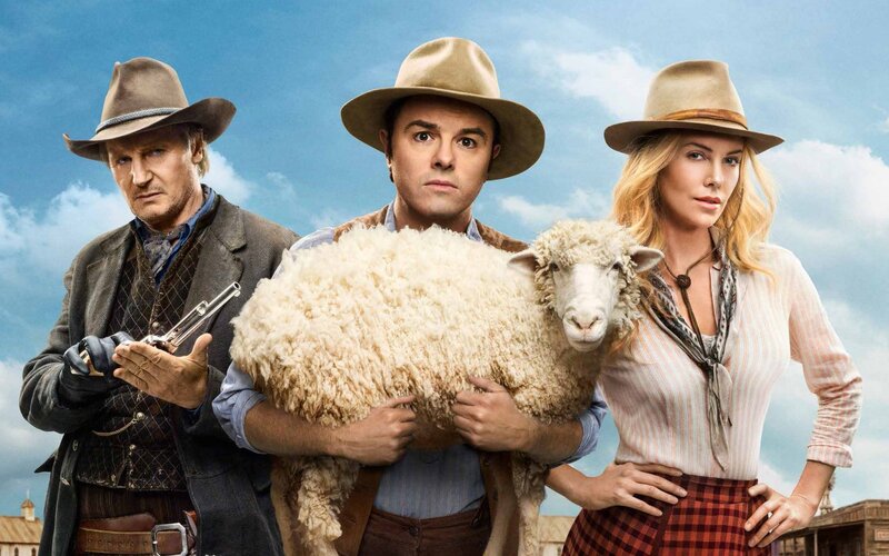 Man Holding a Sheep