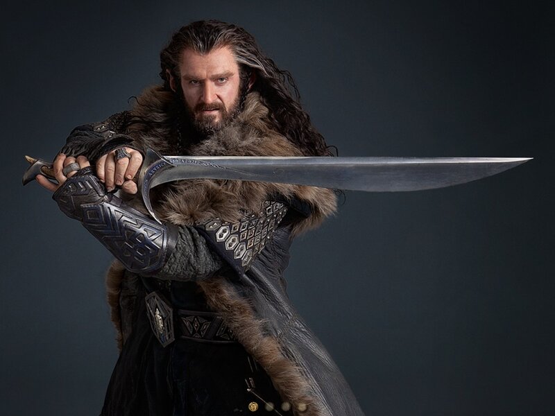 Man Holding a Sword — Black, Dramatic, Photograph