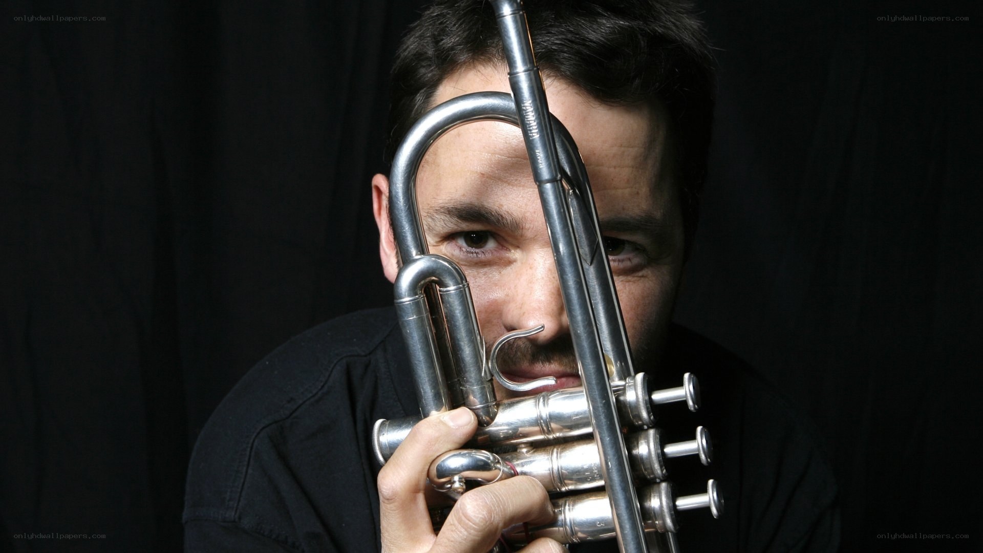 man holding a trumpet