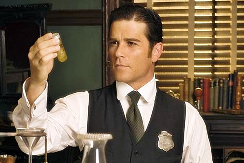 man holding a vial