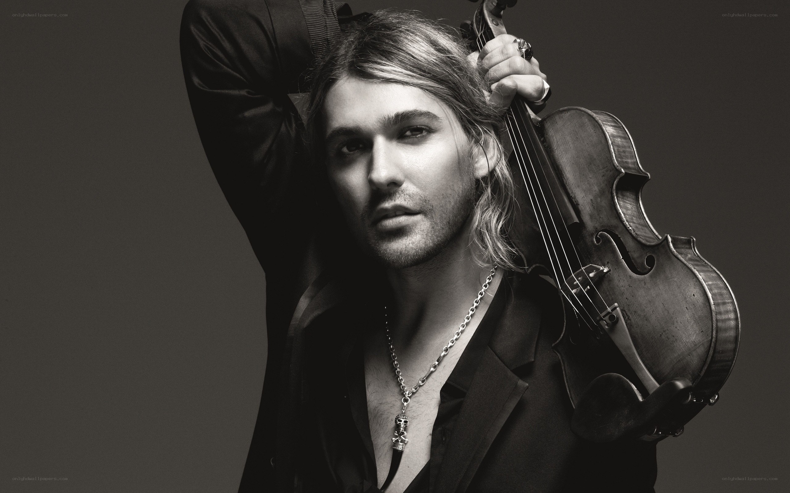 man holding a violin