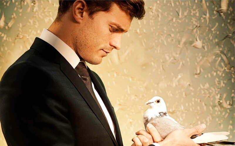 man holding a white dove