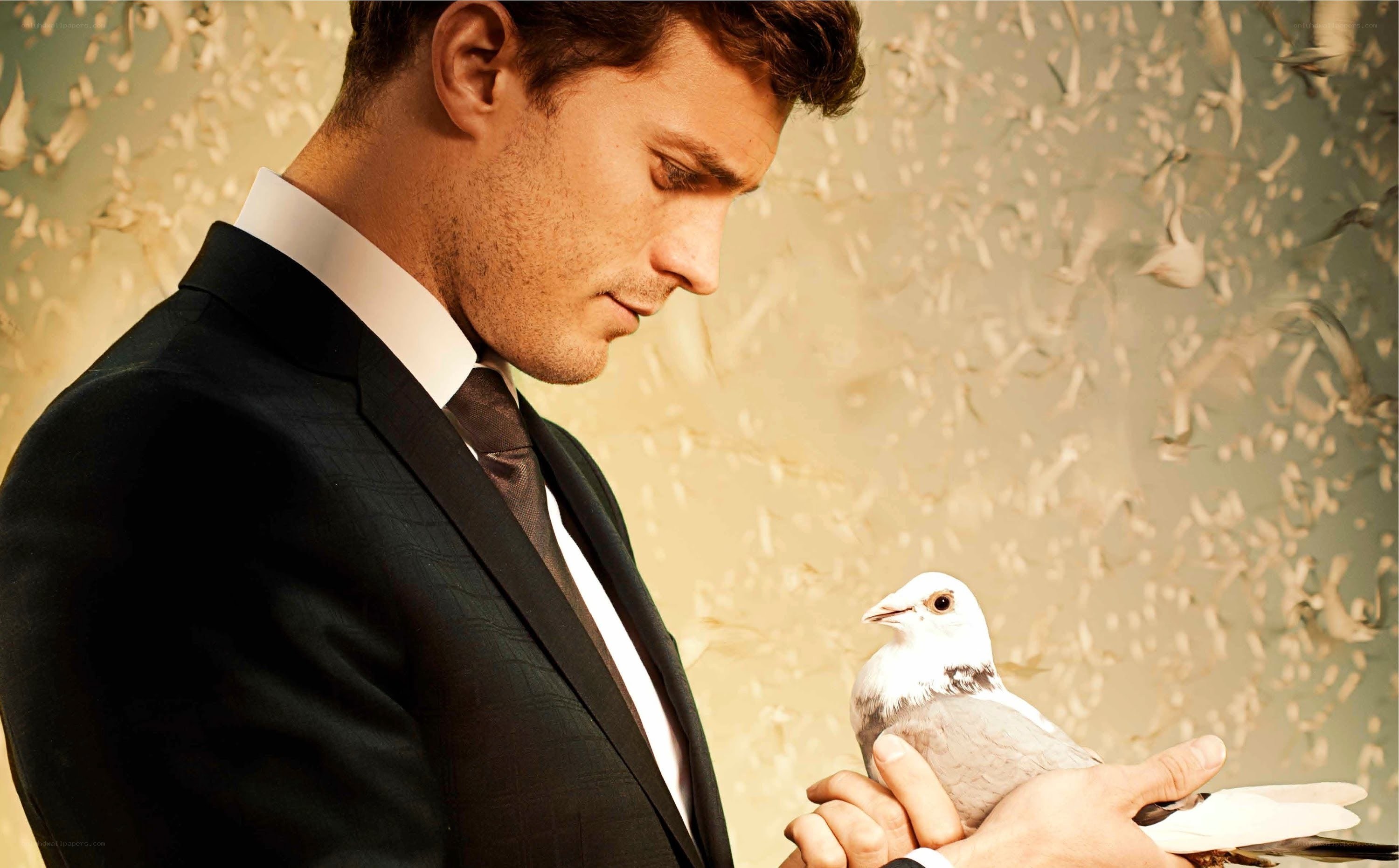 man holding a white dove