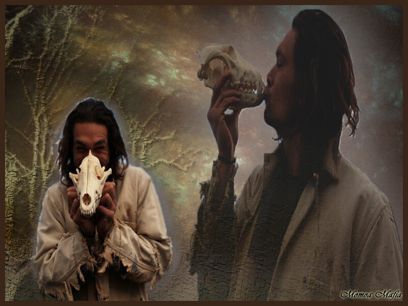 Man Holding Animal Skull