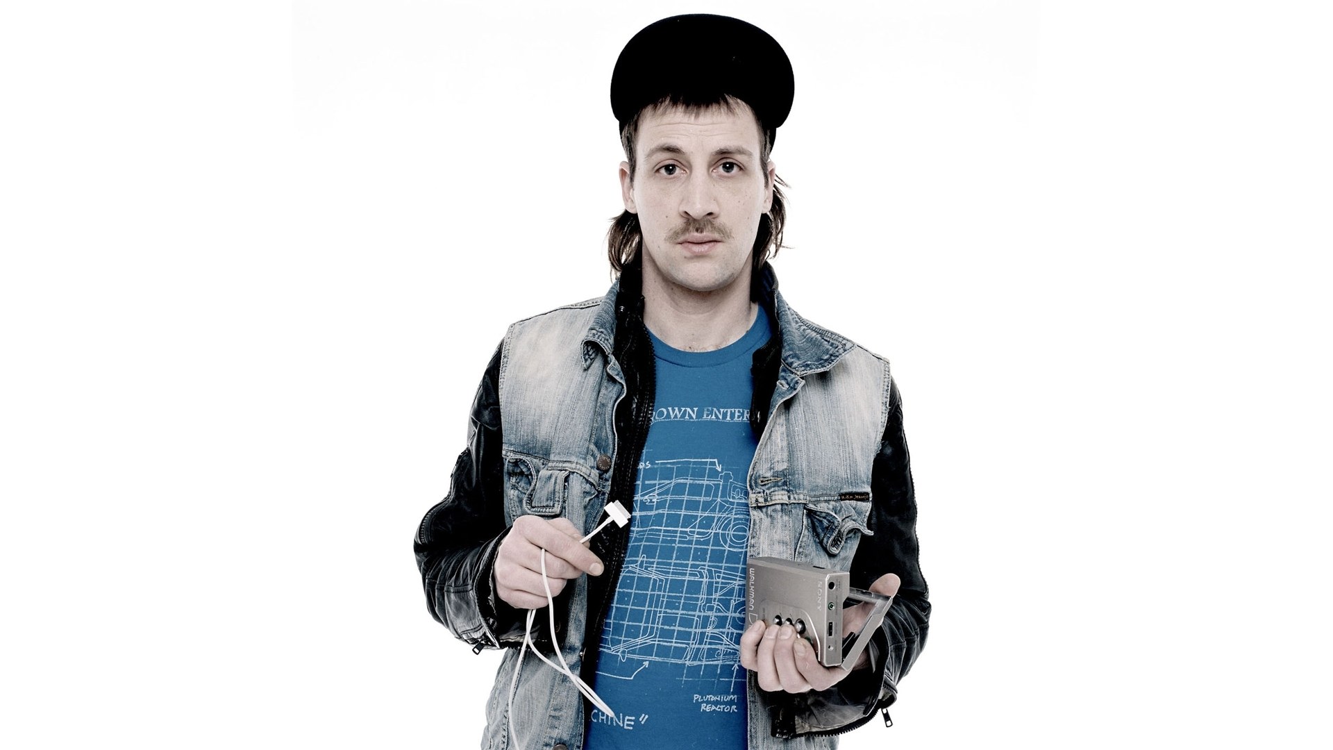 Man holding audio device