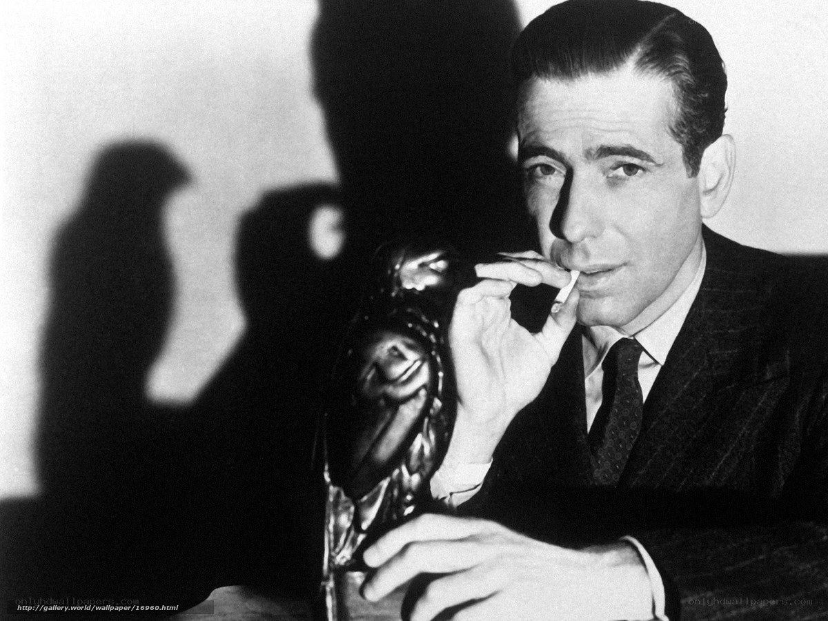 Man holding award and cigarette