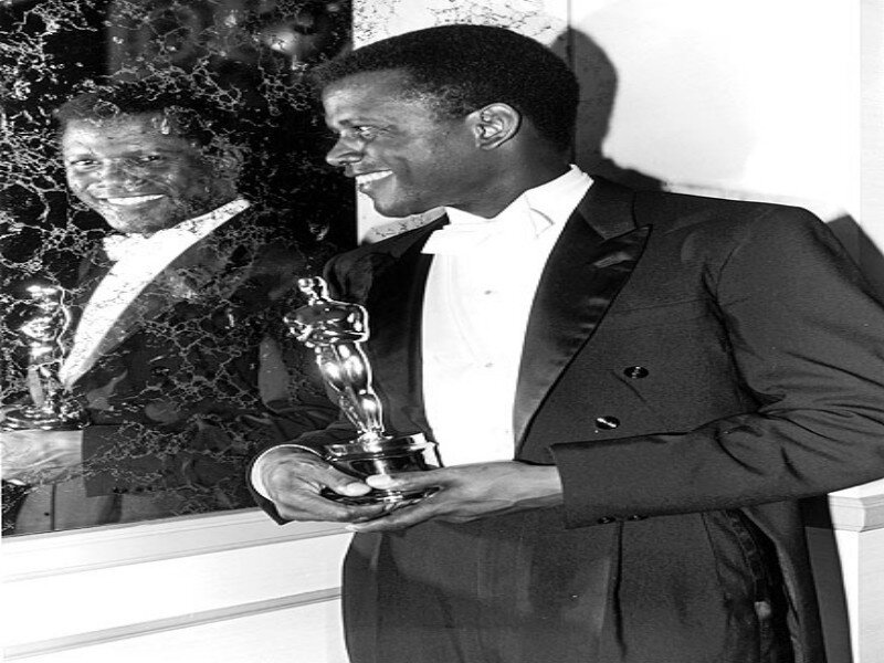 Man Holding Award — Black