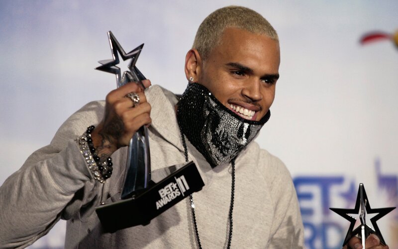 Man Holding Award — Gray, Celebratory