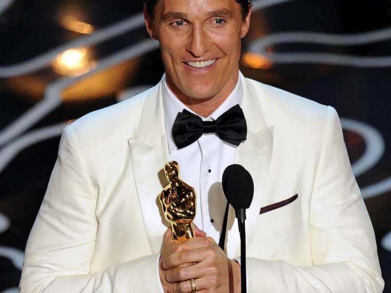 Man Holding Award — White, Celebratory