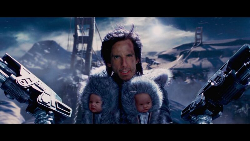 man holding babies in snowy landscape