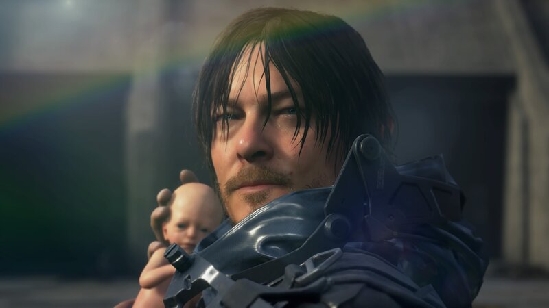 Man Holding Baby Doll