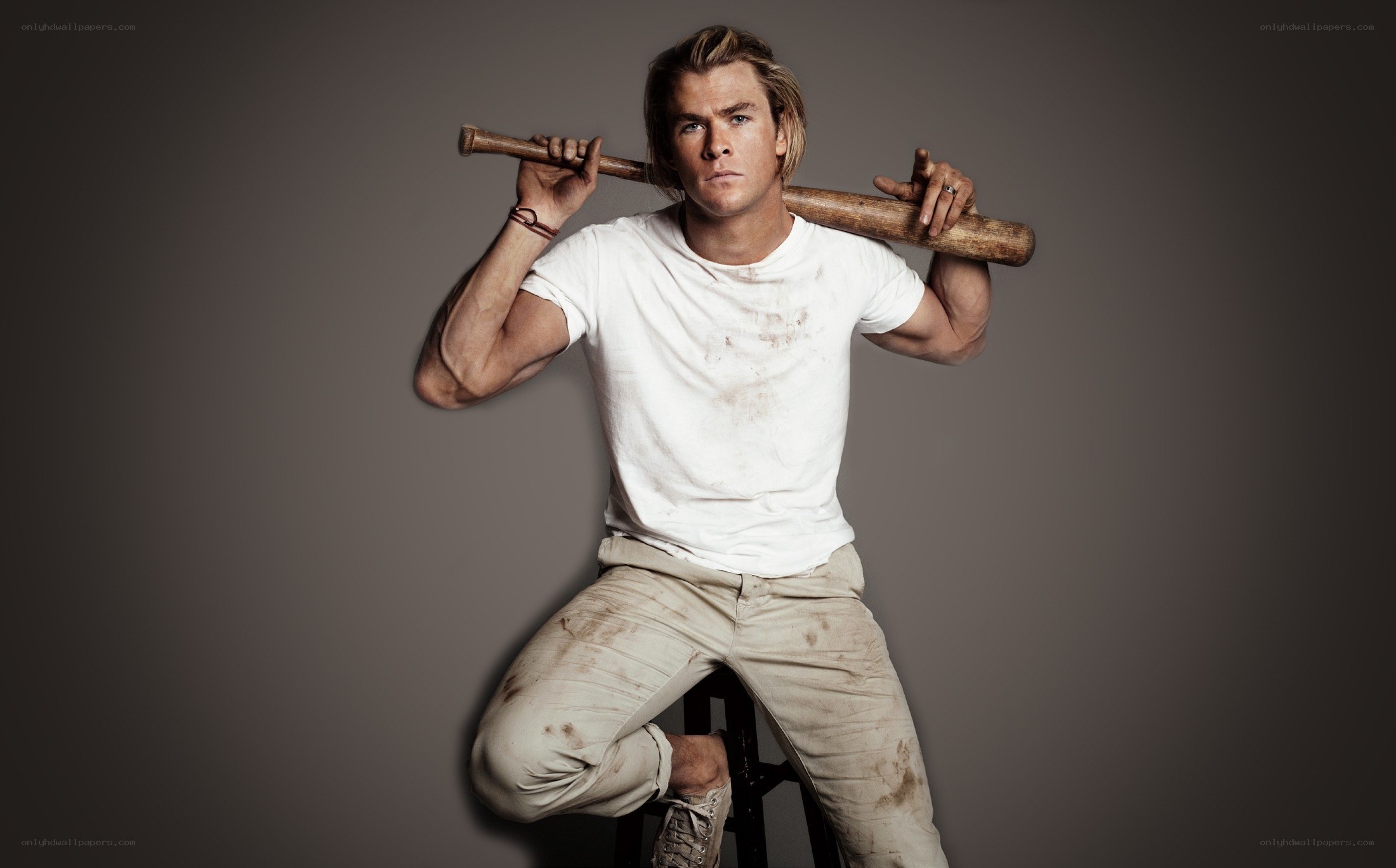 man holding baseball bat