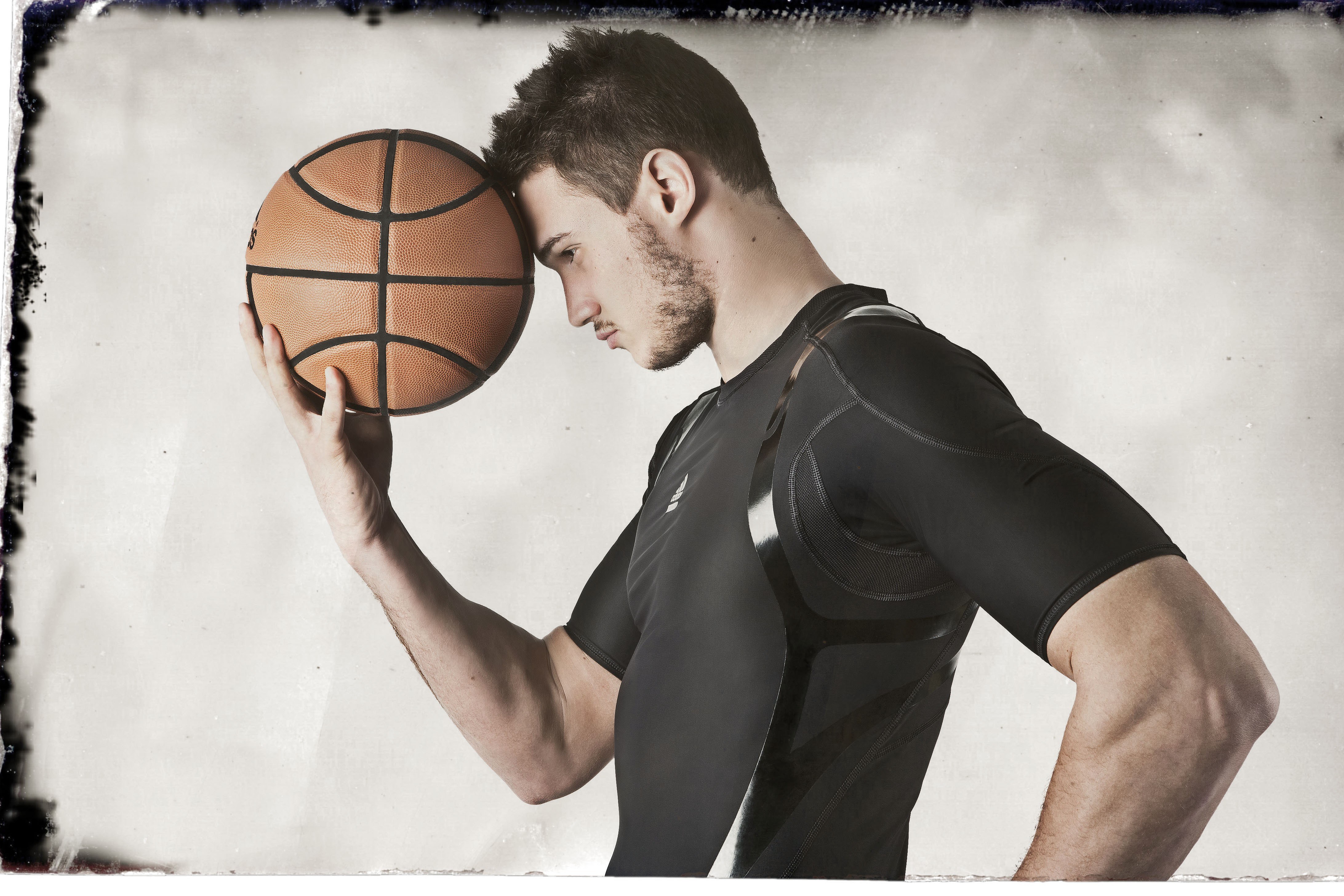 man holding basketball