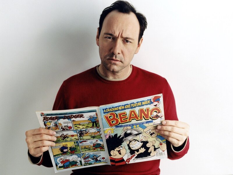 Man holding Beano comic