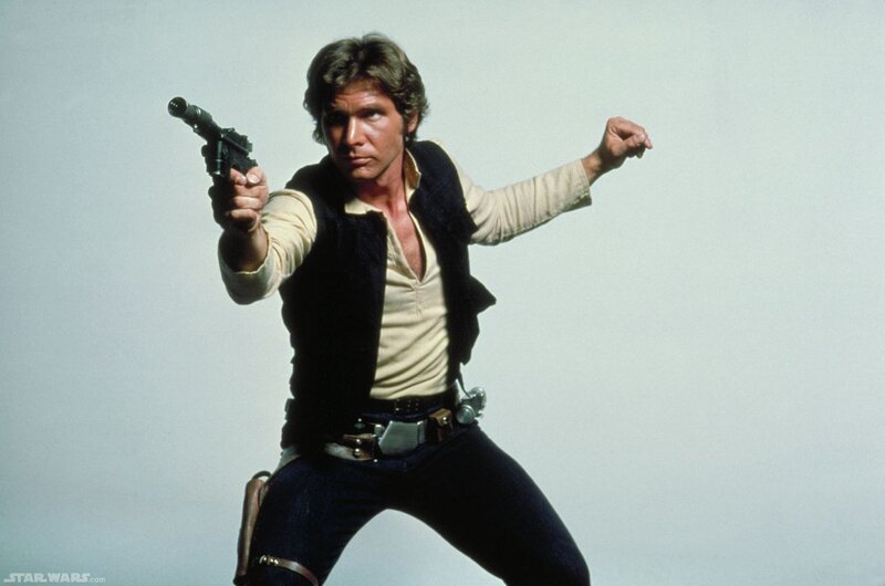 Man Holding Blaster Pistol