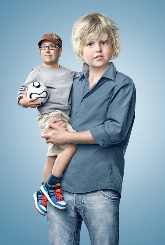 Man Holding Boy