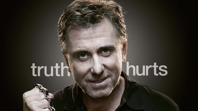 Man Holding Brass Knuckles — Black, Dramatic, Photograph