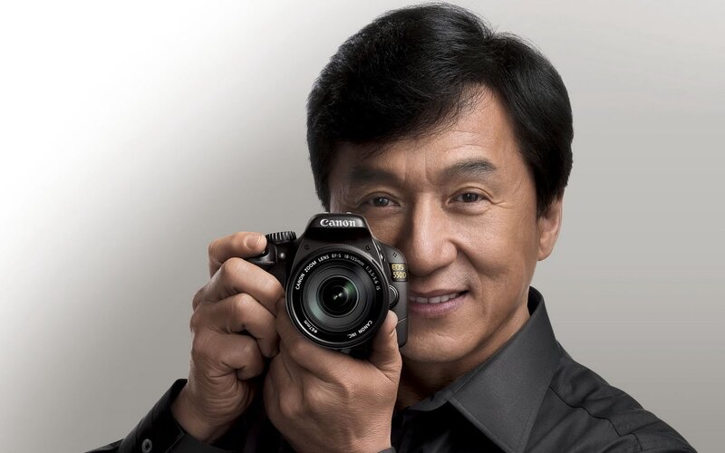 Man Holding Camera — Black, Neutral