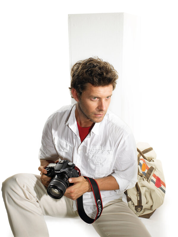 Man Holding Camera — White, Neutral