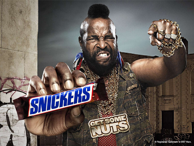 Man Holding Candy Bar