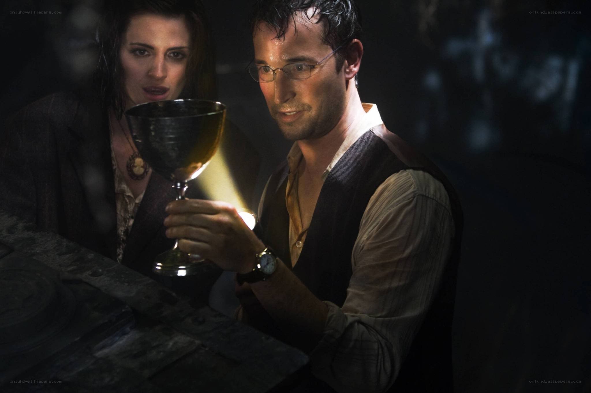 man holding chalice with woman