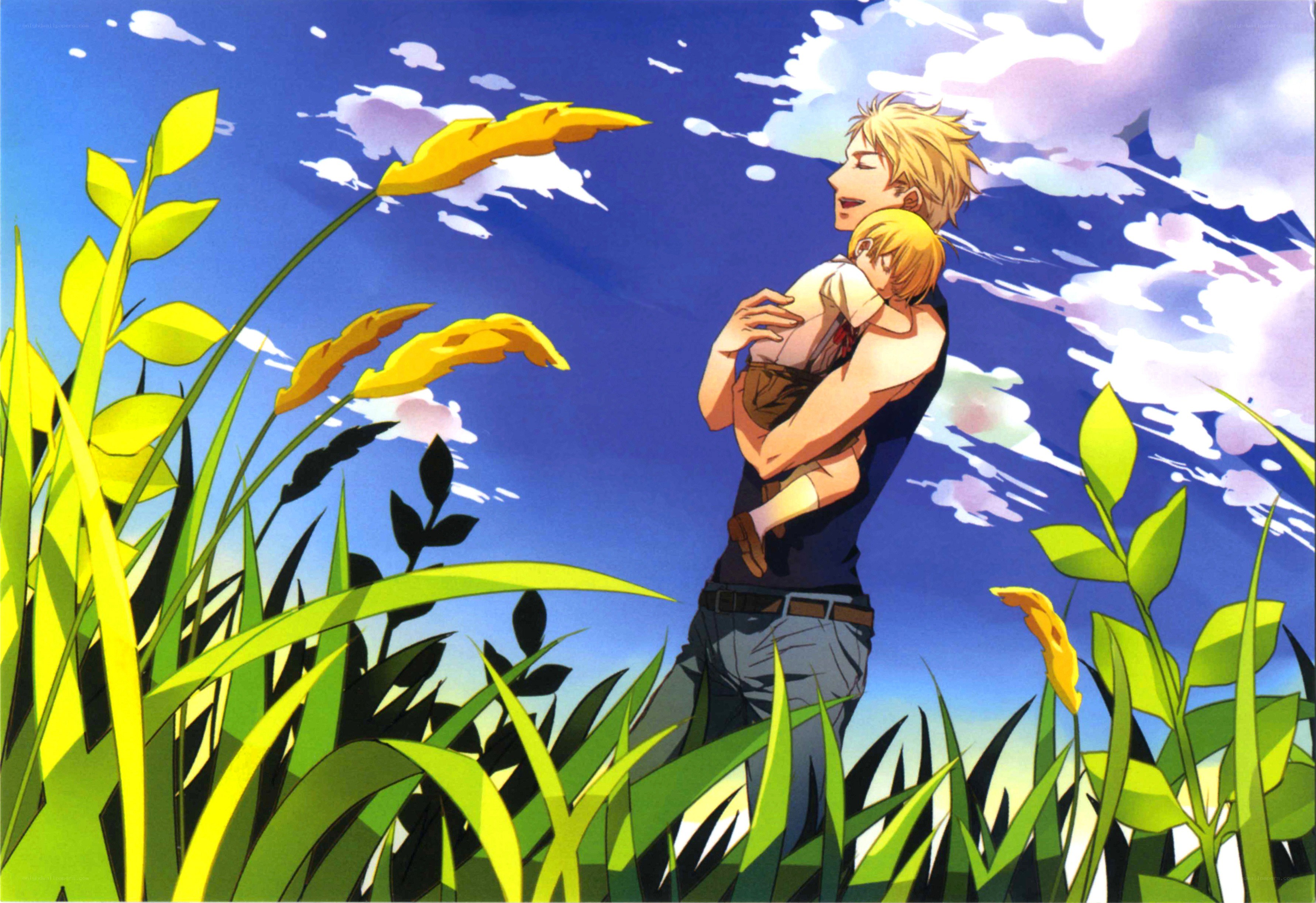 Man holding child in field