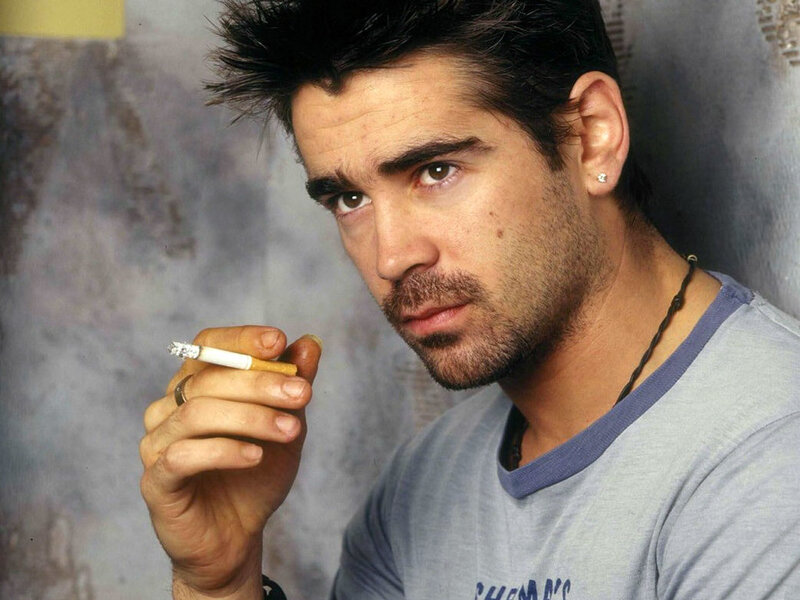 man holding cigarette