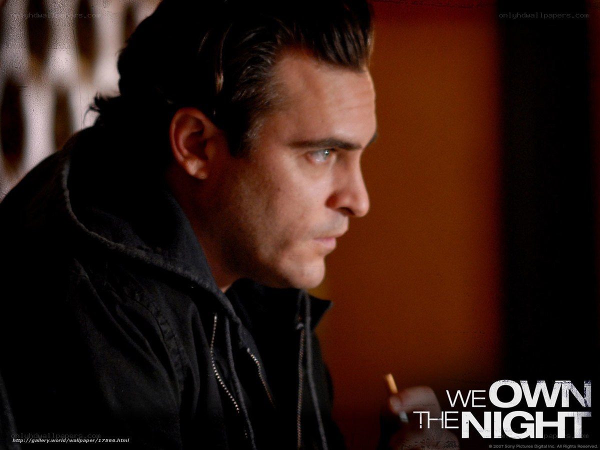 man holding cigarette in profile