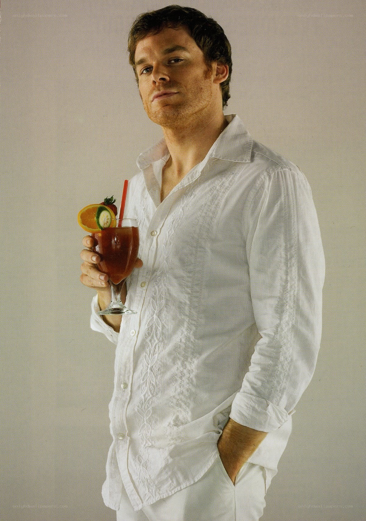 man holding cocktail drink
