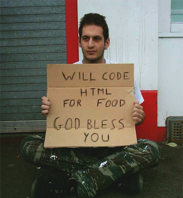 man holding coding sign