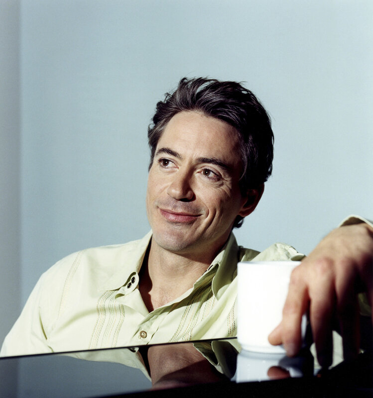 man holding coffee cup
