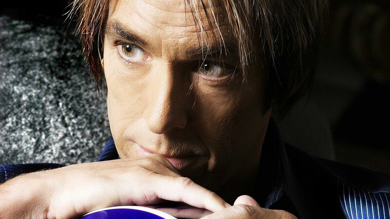 man holding coffee cup
