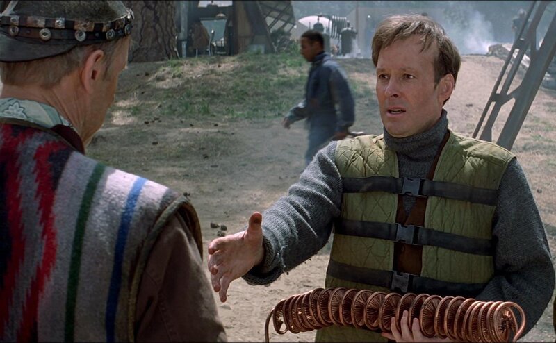man holding coiled wire