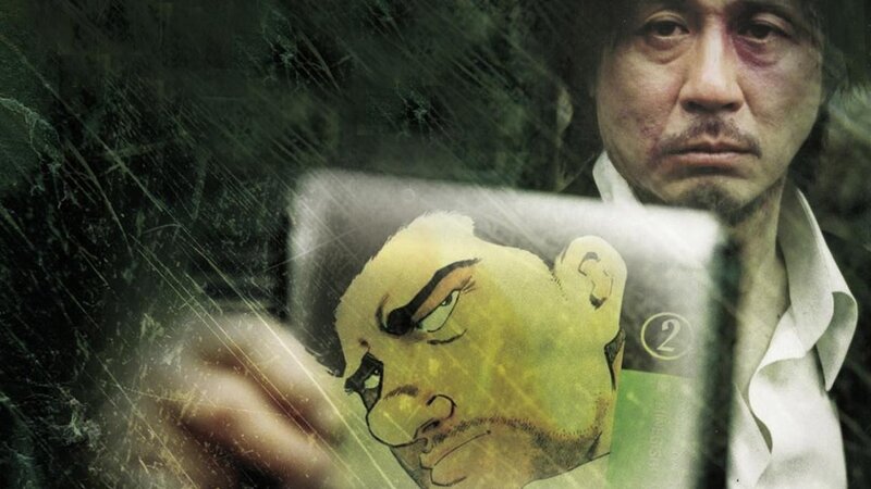 man holding comic book