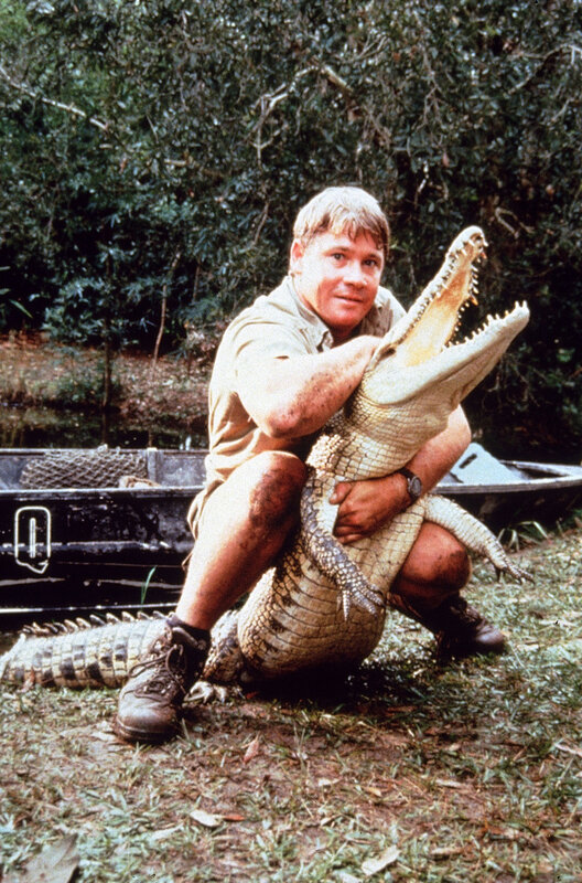 Man Holding Crocodile