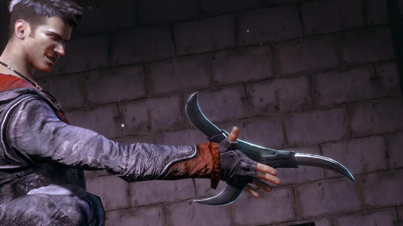 Man Holding Curved Blades