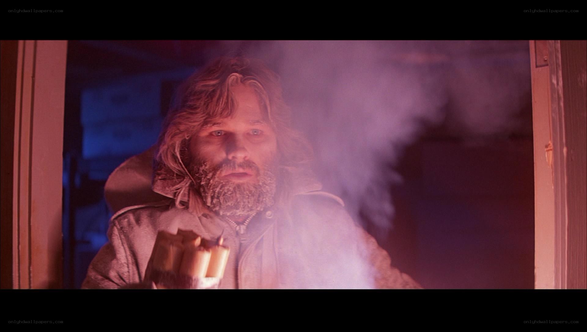 man holding dynamite in smoke