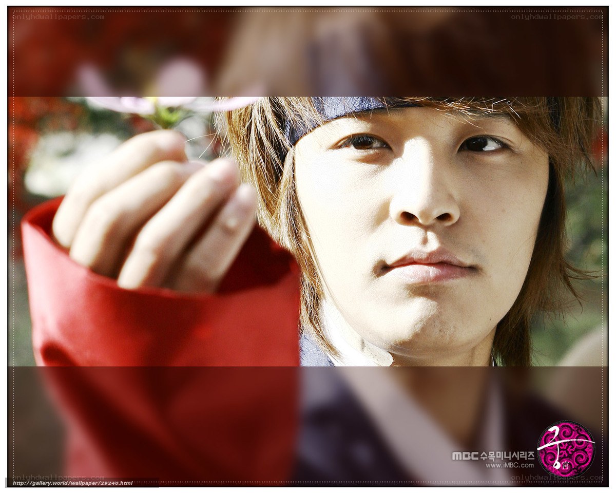 man holding flower in red sleeve