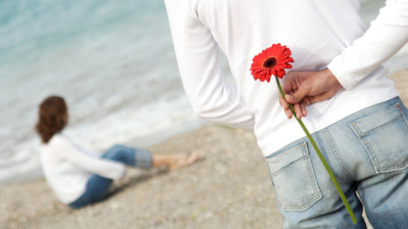 Man Holding Flower — White