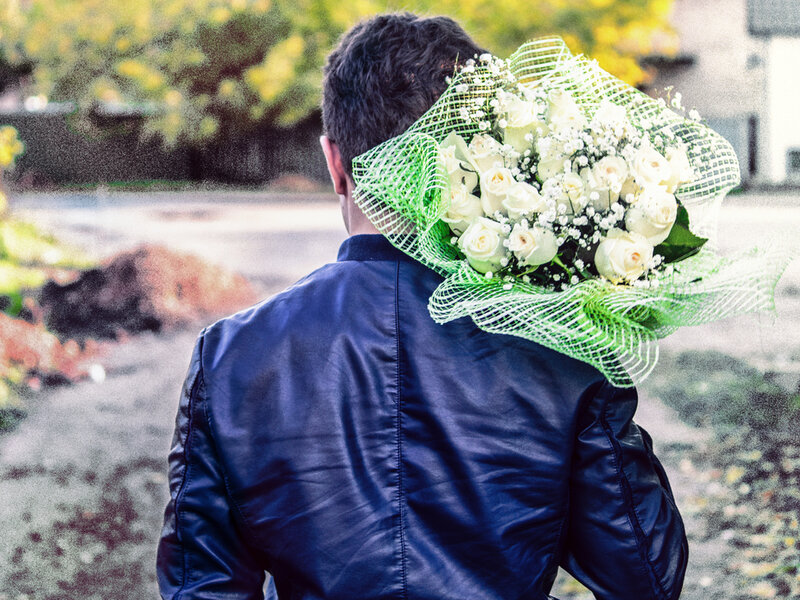 Man Holding Flowers — Blue