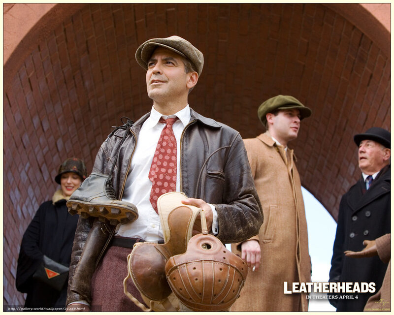 Man Holding Football Gear