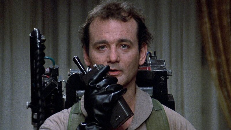 man holding ghostbuster equipment