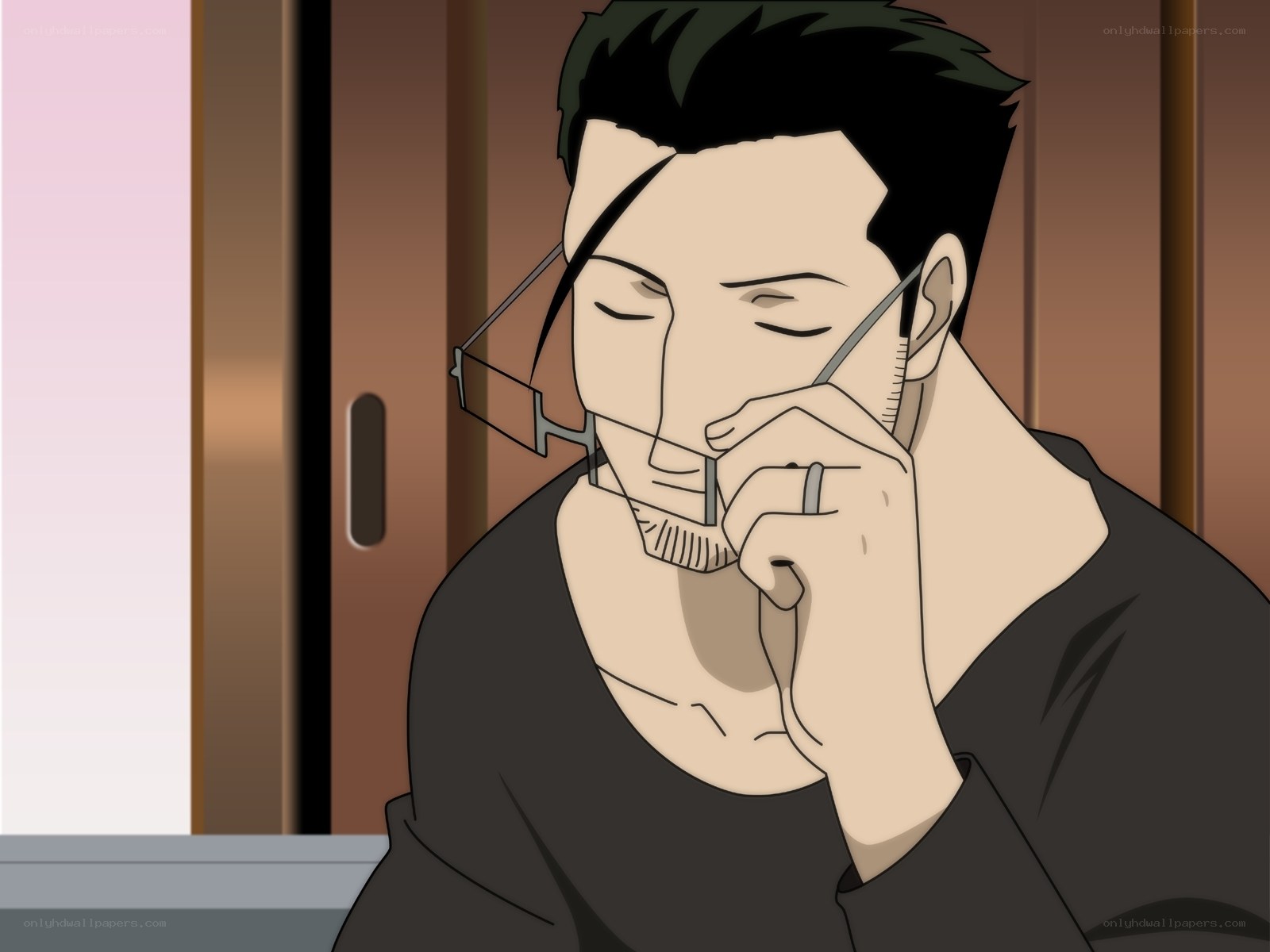 man holding glasses