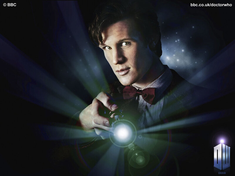 Man Holding Glowing Device — Black, Dramatic