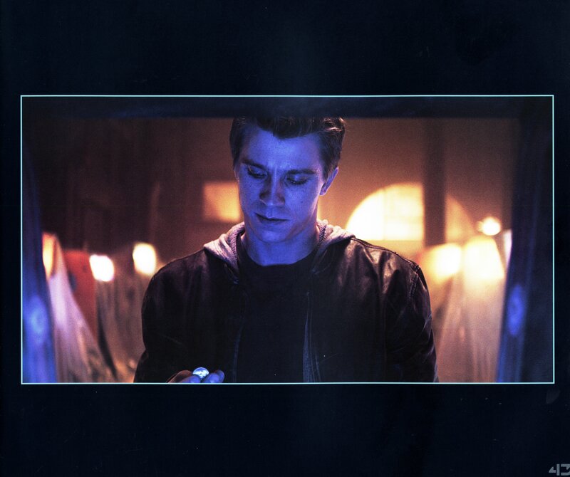 man holding glowing object