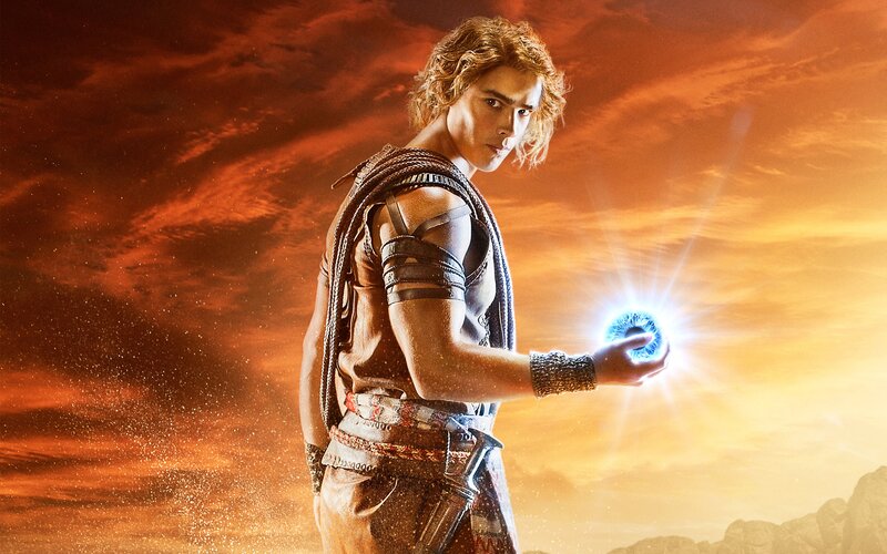 Man Holding Glowing Orb — Orange